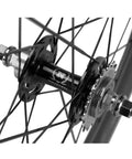 Close-up of Beast Mode Fixed Gear Bike Wheelset hub, 60mm front rim, carbon clincher, showing spokes in detail.