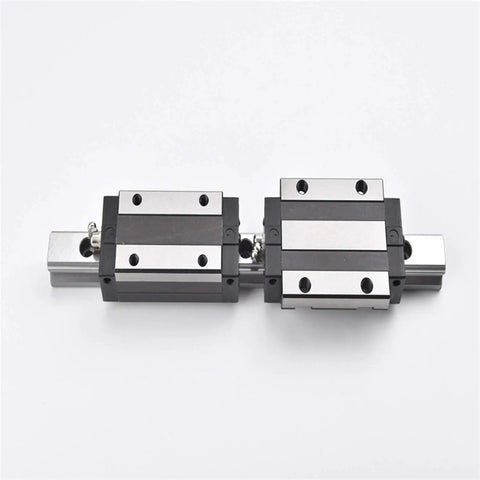 Slick Linear Motion Guide Rail With Ball Bearing Block Sizes 15 20 25 30 35 45 55mm High Precision And Stable Performance Locking Slider For Tight Connections Low Friction Easy Mounting For CNC Robotics And DIY Projects. two ball bearing blocks on a linear rail