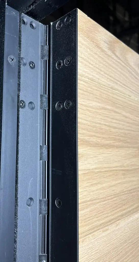 Top-Tier Heavy-Duty Anodized Aluminum Continuous Piano Hinge Full Mortise Design For Rugged Residential Or Commercial Door Refits Quick Diy Fixes Black 83 Inches Long close-up showing hinge on door edge