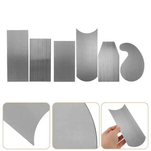 Image of 2 Set Multi Shaped Steel Card Scrapers For Woodworking And Cabinet Fixes With Comfy Grips for surface leveling.