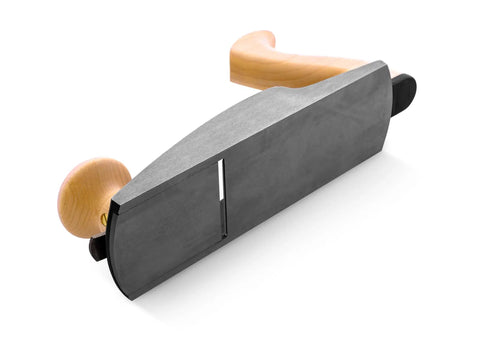 Low Angle Smoothing Plane Loaded With Extra Hhs Blades For Gnarly Figured Lumber Keeps Tearout Outta Sight And Yields A Clean Pass So Finishes Turn Out Hella Sweet On The Bench viewed from a low angle, showcasing wooden handle and steel blade.