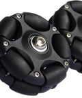 Omni-directional roller wheel hub, black with metal center bolt, close-up view