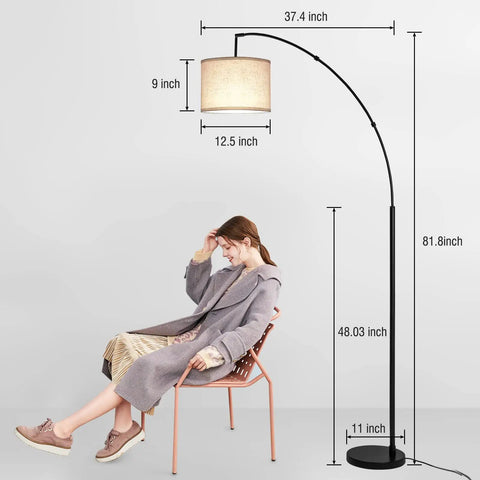 Lit Tall Arc Floor Lamp With Remote Control 81 Inch Tall Dimmable LED Stepless Color Temperature Remote Dimmer Adjustable Hanging Drum Beige Shade Modern Floor Lamp For Living Room And Bedroom with person seated nearby