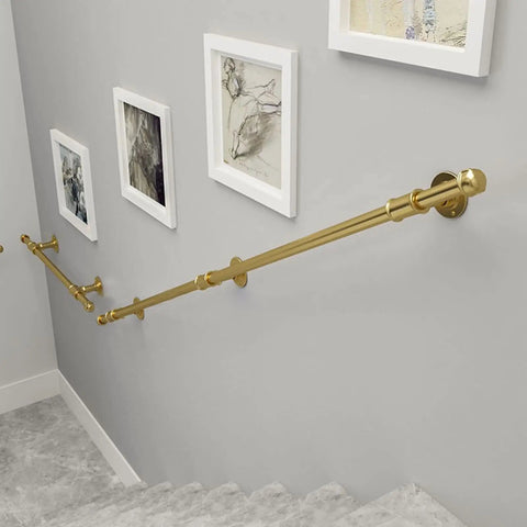 Heavy Duty Gold Wall Mount Staircase Handrail Kit No Sweat Setup Wrought Iron Banister Bracket Set Quick Install Indoor Outdoor Safety Step Railing 17 Foot Long mounted on wall with artwork.
