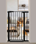 Extra Tall Baby Gate Stand 38 Inch Tall Walk Through Kid Safe Pet Gate for Doorways and Stairs, black metal, with dog behind