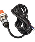 Close-up of PR18-8DP M18 Inductive Proximity Sensor Switch, 8mm sensing, cylindrical industrial sensor, 3-wire PNP, for automation machinery.