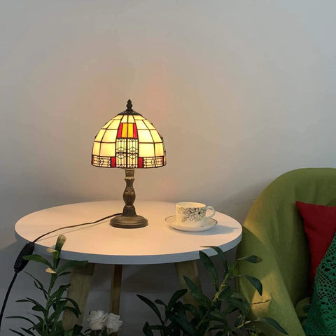 Color Block Tiffany Style Stained Glass Table Lamp, 8-Inch Lampshade, 13-Inch Tall, on white bedside nightstand with plant