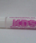 Close-up of a KDS nail glue tube, professional nail products label in pink, part of a ten-pack, pro-grade adhesive for acrylic tips.
