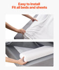 52 Inch Inflatable Toddler Bed Bumper Rail Guard With Safety Flap 2 Pack Non Slip Bed Bumpers being installed under a sheet