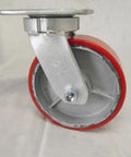 Six By Two Inch Kingpinless Casters Featuring Bombproof Polyurethane Treads Over Rugged Steel Cores Swivel And Rigid Four Pack side view of caster wheel with steel mounting plate