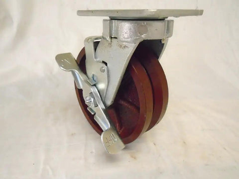 Heavy Hitter 6 Inch Swivel Casters With Secure Top Lock Kingpinless Base V Groove Treads Built Solid Ductile Steel Handles 1500 Lbs smooth rolling red caster with locking mechanism.