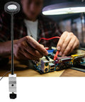 3X LED Magnifying Table Clamp Helping Hand with flexible arm used for precise PCB repair on electronics.