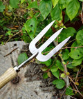 Ergonomic Stainless Steel Hand Fork for Gardening, Rugged Cultivator Tool With Polished Finish, Easy To Clean in garden setting