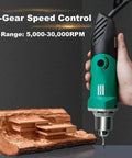 Reliable Workhorse Electric Die Grinder With 480W Motor And Six Step Variable Speed Dial Delivers A Clean 30000 Rpm showcased on wooden log.