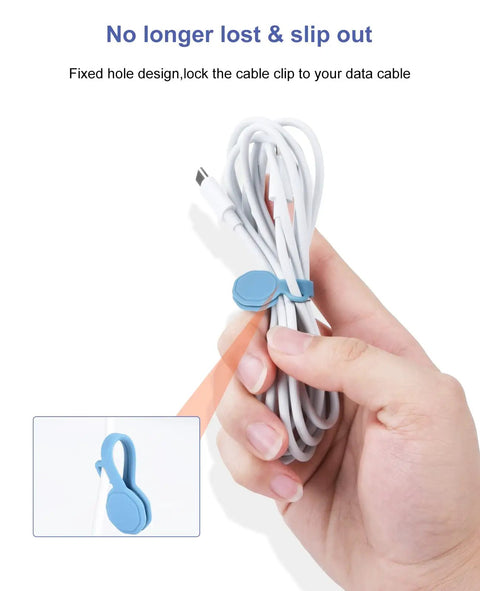 Hand holding blue 8 Pack Silicone Magnetic Cable Ties And Clips Cord Organizer Set securing white cables