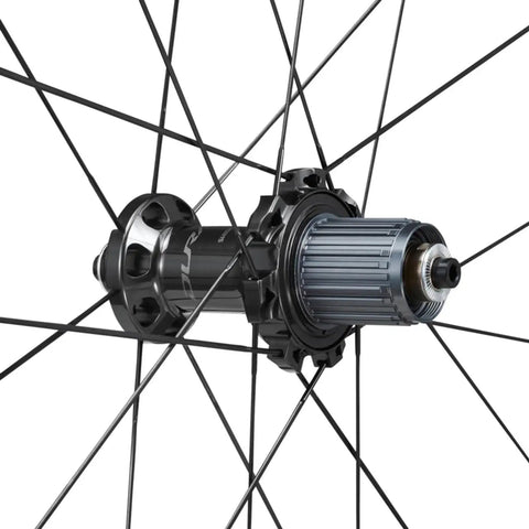 Close-up of hub and spokes on Dura-Ace Wh-R9270 C36 Carbon Road Wheelset 700c Tubeless Ready With 36mm Aero Depth, 21mm Internal Width, Hooked Rim.
