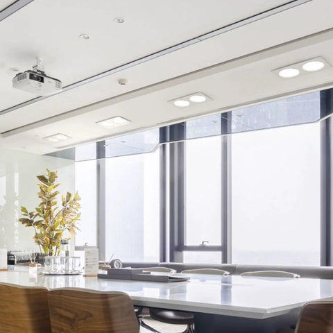 LED Spot Lights Square Double Head Recessed Downlight for Living Room illuminating modern office space with large windows.