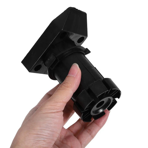 Hand holding black ABS adjustable cabinet legs leveling foot with height adjustment for wardrobes and bathrooms, 4-pack.