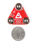 Straight Up Badass Muscle Sensor Module Featuring High Performance Emg Technology With Keyed Snap Plugs For Seamless Arduino Integrations And Totally Dope Biomechanics Prototypes on red circuit board, quarter for size reference.