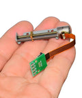Precision 8mm Stepper Motor With Smooth Screw Shaft Linear Actuator For Robots And Diy Builds in hand, showcasing motor and connector.