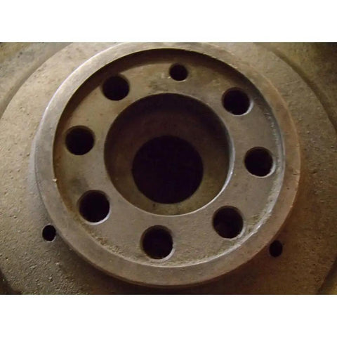 Top Shelf Aftermarket Flywheel With Ring Gear Boasting 126 Teeth Built Tough For International Harvester Case Tractors And D239 Diesel Rigs Rocking An 11 Inch Clutch close-up of central hole and teeth details.