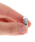 Hand holding Stainless Steel Fencing Tip Replacement Head For Epee And Sabre Practice Gear Upgrade Pro Grade Precision And Stability.