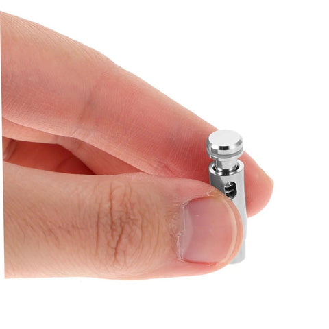 Hand holding Stainless Steel Fencing Tip Replacement Head For Epee And Sabre Practice Gear Upgrade Pro Grade Precision And Stability.