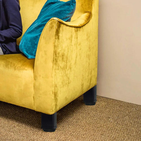 Yellow sofa with black metal legs, featuring Adjustable Black Metal Desk Legs Set Of 4, 31.5 Inch Tall Square Office Table Legs.