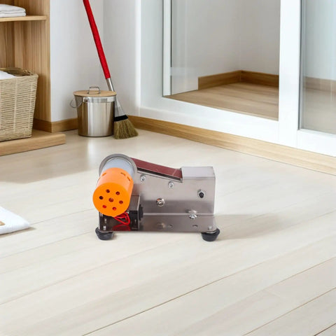 Merryhappy Portable Electric Belt Sander With High Torque Motor For Versatile Grinding And Polishing Mini Sanding Tool on a workbench.