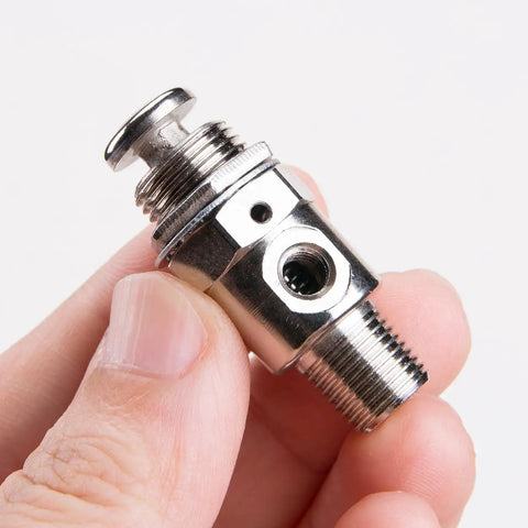 Close-up of Tac-3P Pneumatic Valve With Push Button Switch, showing M5x0.8 Connection, compact metal design for industrial use