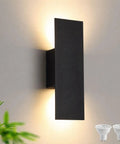 Oberade Single Hardwired Black LED Wall Light Bathroom Sconce 3000K Indoor mounted on a wall with soft glow lighting.