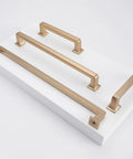 Champagne Bronze Cabinet Handles Set of 10, 5 Inch (128mm) Drawer Pulls displayed on a white board, front view