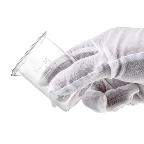 Sturdy Glass Beaker Set 50ml Six Pack, 3.3 Borosilicate Griffin Low Form Lab Glassware With Printed Graduations And Large Marking Spot held by hand