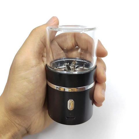 Hand holding On The Go Portable Mini Electric Grinder For Spices And Herbs With 50ml Jar 400mAh Battery Double Leaf