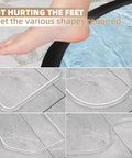 Slick Nifty 39 Inch Black Shower Threshold Water Dam Stopper with flexible shapes ideal for foot safety, across tiled bathroom floor.