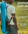 Person carrying Portable 7x7ft Backpack Sun Shelter with Lightweight Shade Canopy in blue carry bag, 10.5 lbs, for easy transport.