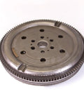 Badass Heavy Duty Dual Mass Flywheel Swap For 2003 Through 2007 Ford Focus 2.3 Liter Four Cylinder Engines, top view, metallic design.