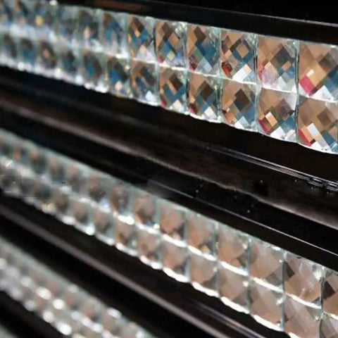 Close-up of crystal diamond mirror glass mosaic tiles showing silver facets for backsplash, kitchen, and bathroom walls.