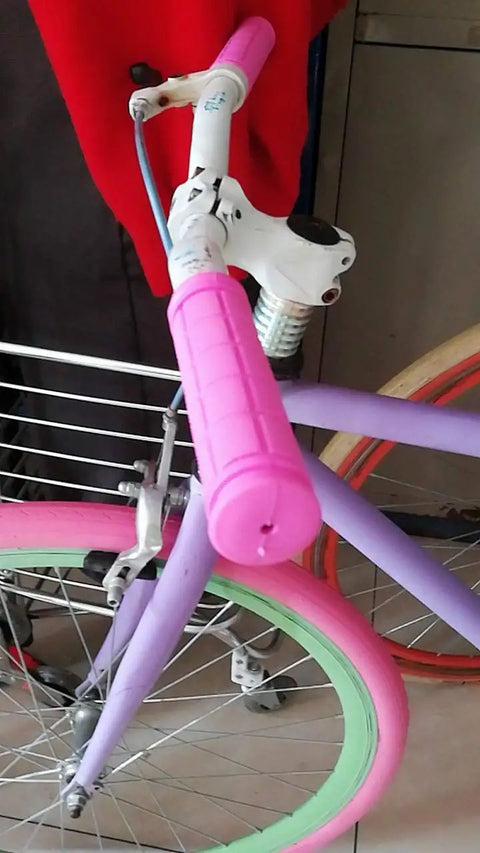 Pink non slip bike handlebar grips for kids bikes, soft grippy TPR rubber bar wraps, 4.7 inch, 22mm ID, on cruiser.