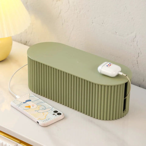 Green cable management box with phone and charger showcasing Two Pack Cable Management Box With 20 Cable Ties For Power Strips And Surge Protectors Cable Organizer For TV And Computer Cables Adapters And Wires Hider Box For Home And Office White.