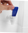 Hand using the faucet on Cold Water Dispenser For Desk Portable Water Bottle Dispenser With Faucet For Home Office Camping And Outdoor Use Space Saving Tabletop Design Easy To Use Clean Durable BPA Free Materials