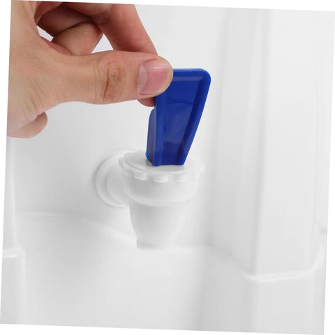 Hand using the faucet on Cold Water Dispenser For Desk Portable Water Bottle Dispenser With Faucet For Home Office Camping And Outdoor Use Space Saving Tabletop Design Easy To Use Clean Durable BPA Free Materials