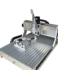 Heavy Hitter 3040 CNC Router With 2200W Spindle And Upgraded Fourth Axis Rotary, USB Enabled milling machine on metal table.