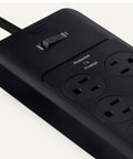 Close-up of the Slick Black Heavy Duty 12 Outlet Surge Protector Power Strip with switch and six outlets.