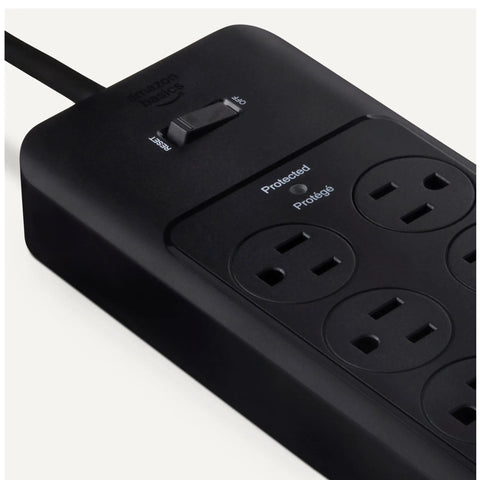 Close-up of the Slick Black Heavy Duty 12 Outlet Surge Protector Power Strip with switch and six outlets.
