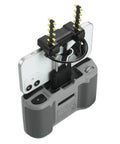 5.8GHz Antenna Boosters For DJI Remote Controllers N3 N2 N1 N1C attached to a remote, boosting signal for drones