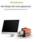 Heavy Duty Smooth Operating Electric Crimping Machine No Fuss Automatic Terminal Presser for 10Mm Insulated Non Insulated Tube Terminals next to a computer monitor.