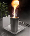 Straight Up Heavy Duty Six Kilogram Graphite Crucible With Ceramic Shield Cover For High Temperature Melting And Metal Casting Projects pouring molten metal.