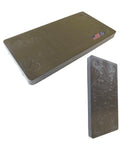 Hella Tough Quarter Inch Black Plastic Flat Plate Shims providing leveling support for cabinets and tile spacers.