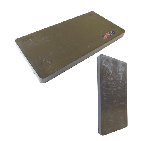 Hella Tough Quarter Inch Black Plastic Flat Plate Shims providing leveling support for cabinets and tile spacers.